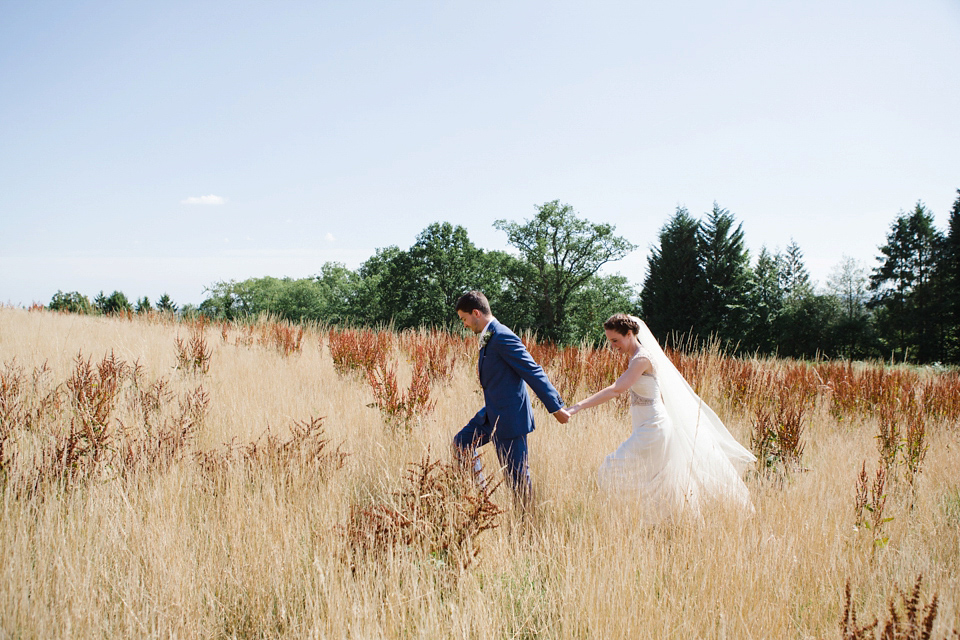 A glamorous Gwendolynne gown for a Summer garden party wedding. Photography by Lucy Davenport.