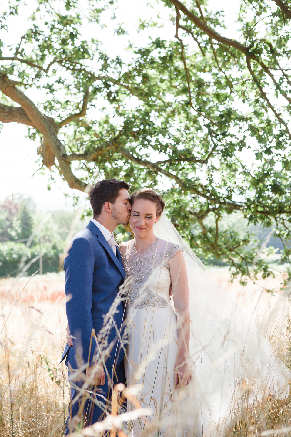 A glamorous Gwendolynne gown for a Summer garden party wedding. Photography by Lucy Davenport.