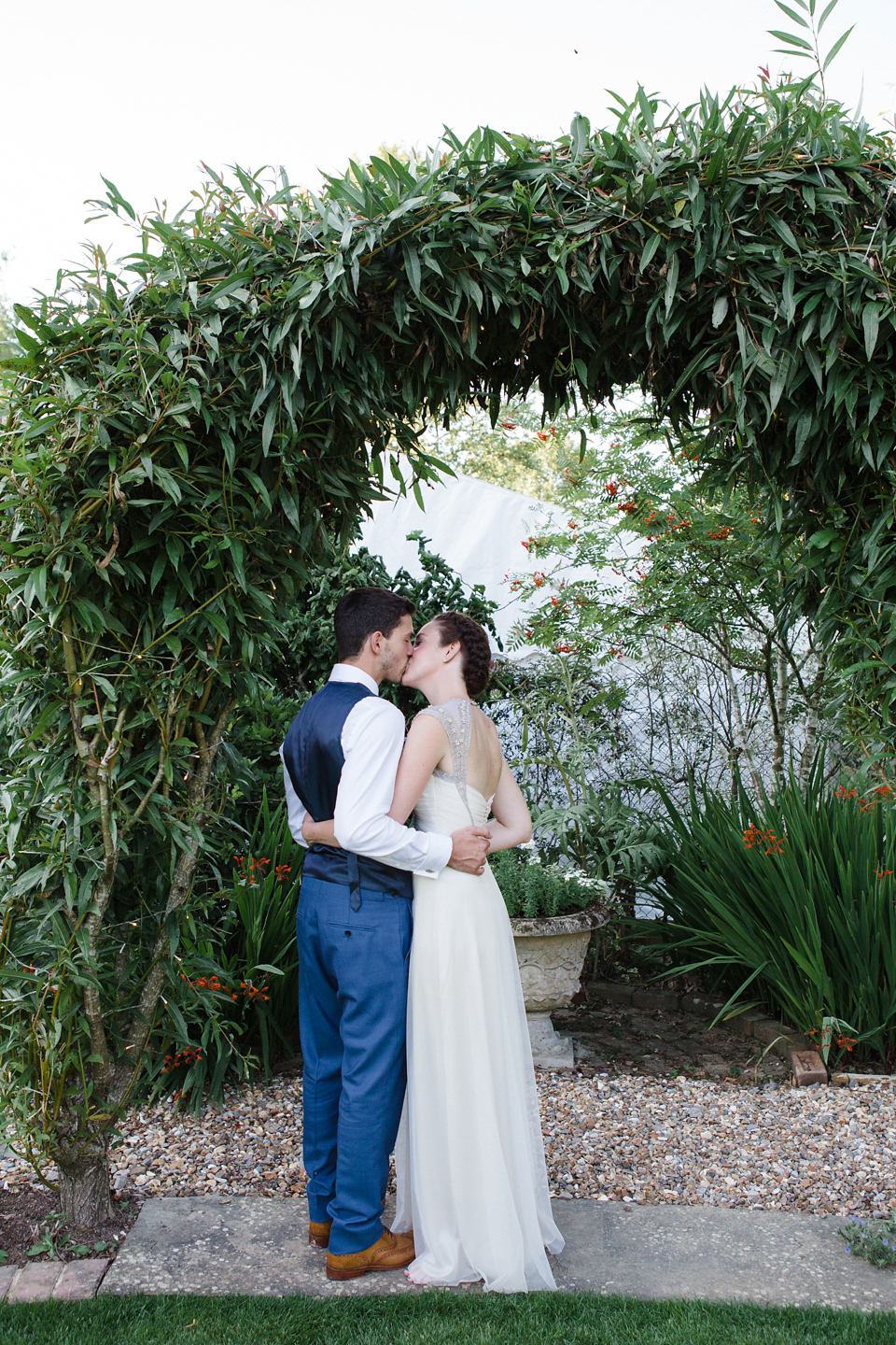 A glamorous Gwendolynne gown for a Summer garden party wedding. Photography by Lucy Davenport.