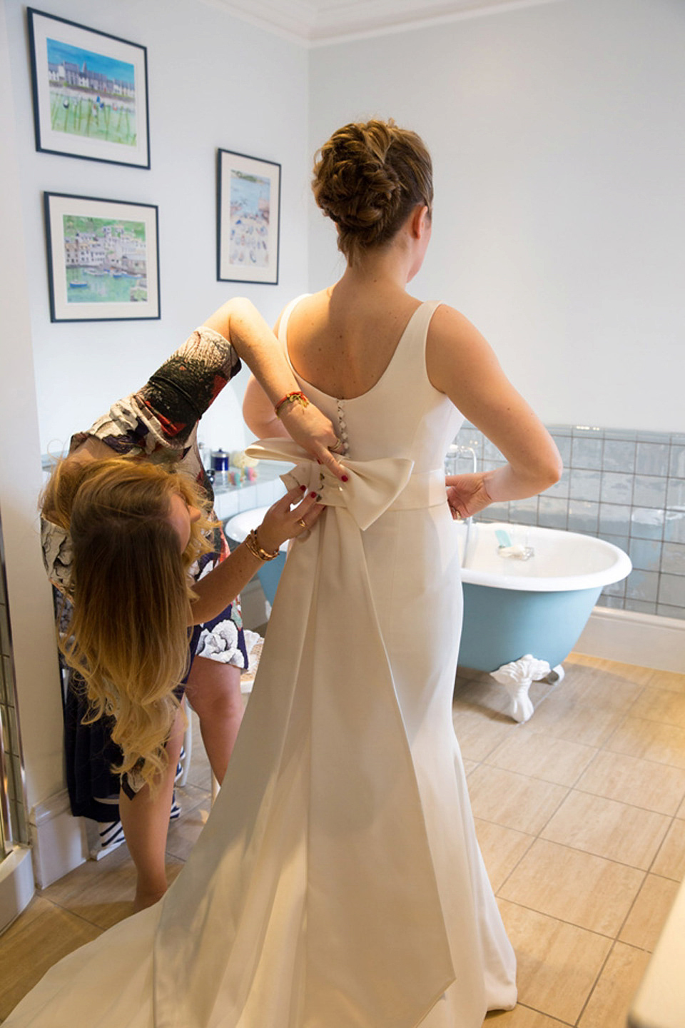 A modern and elegant Suzanne Neville gown for a Winter wonderland wedding.