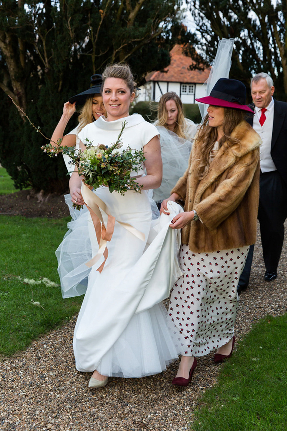 A modern and elegant Suzanne Neville gown for a Winter wonderland wedding.