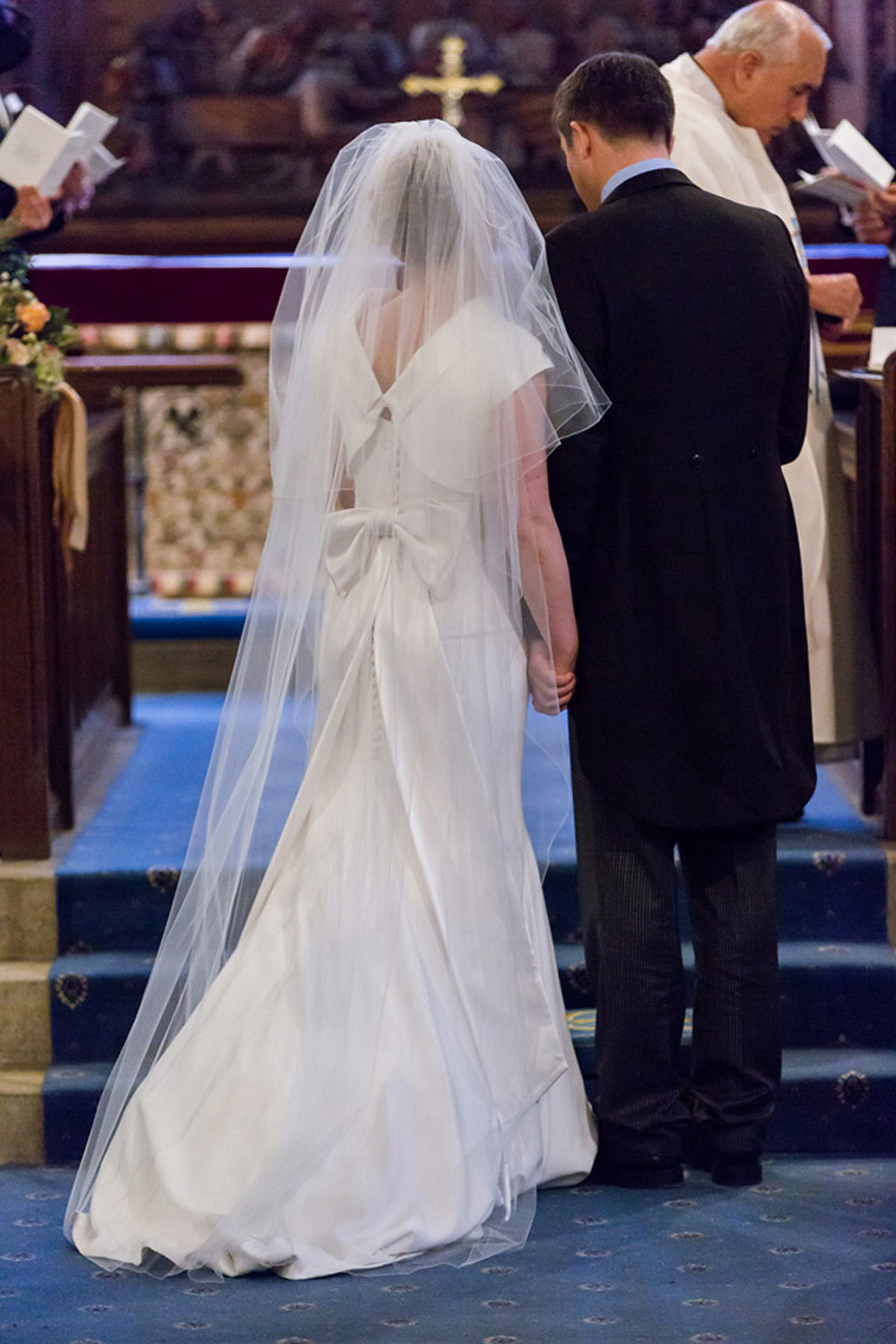 A modern and elegant Suzanne Neville gown for a Winter wonderland wedding.