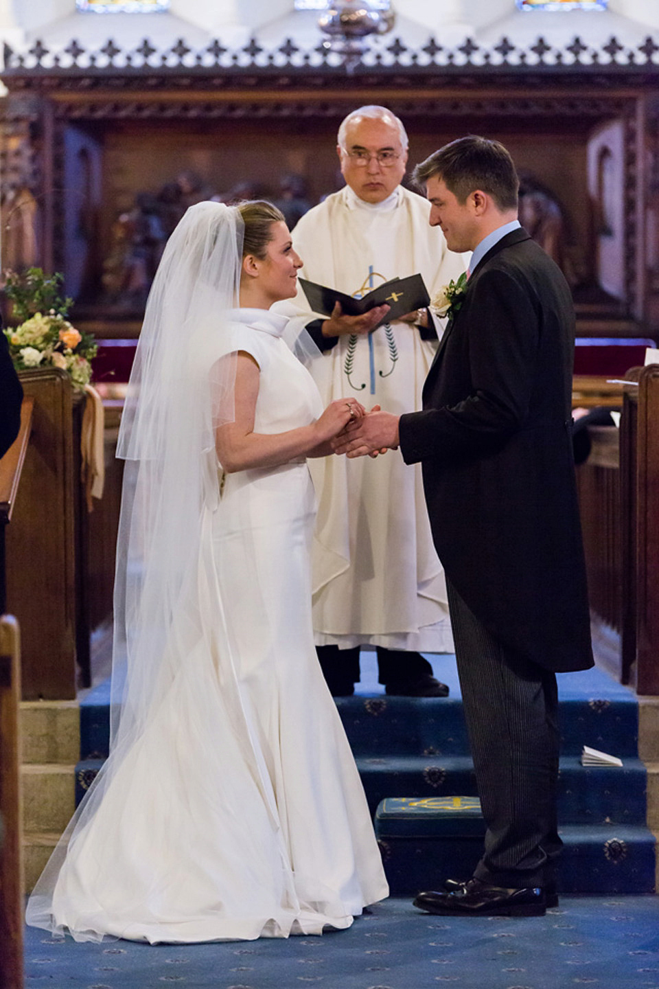 A modern and elegant Suzanne Neville gown for a Winter wonderland wedding.