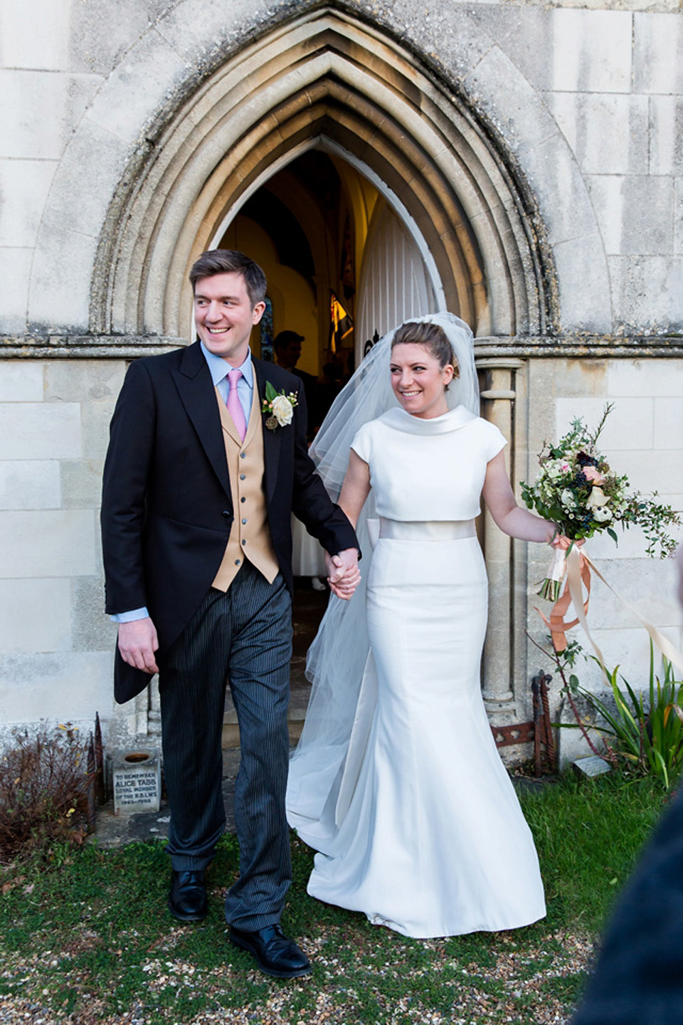 A modern and elegant Suzanne Neville gown for a Winter wonderland wedding.