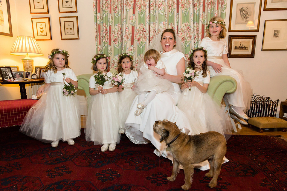 A modern and elegant Suzanne Neville gown for a Winter wonderland wedding.