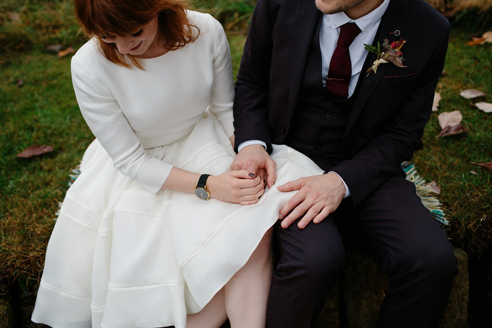 Lizzie wore a 1960's inspired short dress by Delphine Manivet for her intimate wedding in Edinburgh. Photography by Caro Weiss.