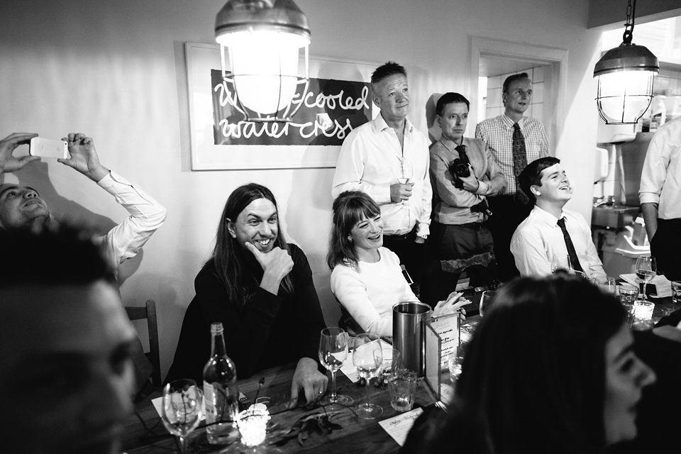 Lizzie wore a 1960's inspired short dress by Delphine Manivet for her intimate wedding in Edinburgh. Photography by Caro Weiss.