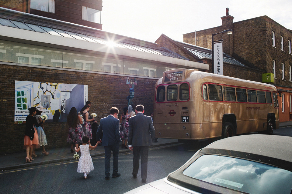 A bride in glasses for her Autumn and Art Deco inspired wedding at The Asylum in London. Images by Hearts on Fire Photography.