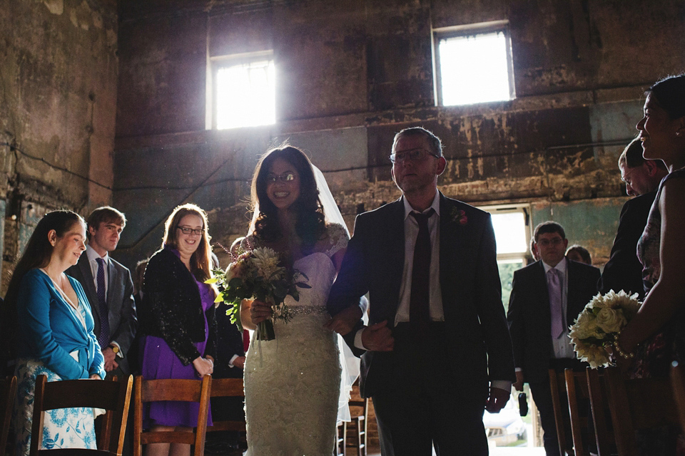 A bride in glasses for her Autumn and Art Deco inspired wedding at The Asylum in London. Images by Hearts on Fire Photography.