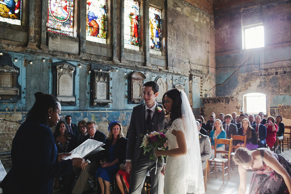 A bride in glasses for her Autumn and Art Deco inspired wedding at The Asylum in London. Images by Hearts on Fire Photography.