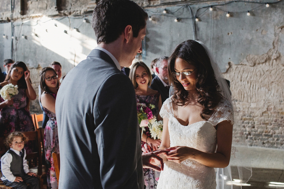 A bride in glasses for her Autumn and Art Deco inspired wedding at The Asylum in London. Images by Hearts on Fire Photography.