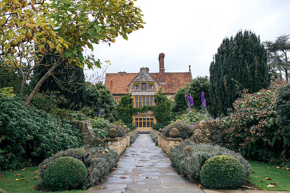 A short 60's inspired REDValentino dress for an Autumn wedding at Le Manoir Aux Quat'Saisons. Photography by Jordanna Marston.