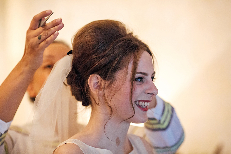 A short 60's inspired REDValentino dress for an Autumn wedding at Le Manoir Aux Quat'Saisons. Photography by Jordanna Marston.