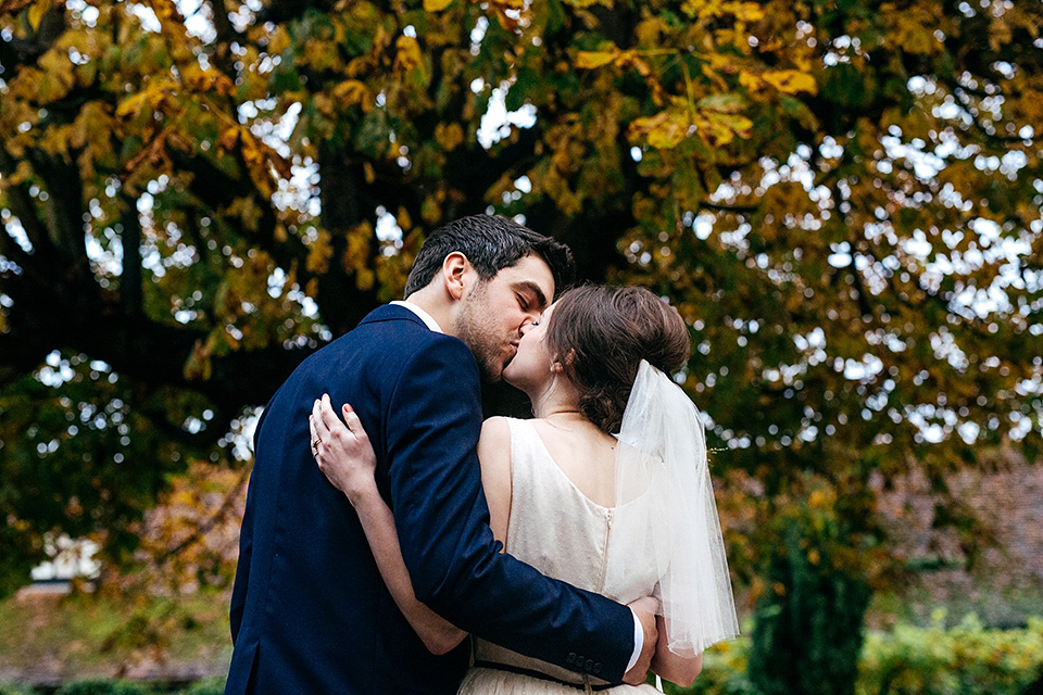 A short 60's inspired REDValentino dress for an Autumn wedding at Le Manoir Aux Quat'Saisons. Photography by Jordanna Marston.