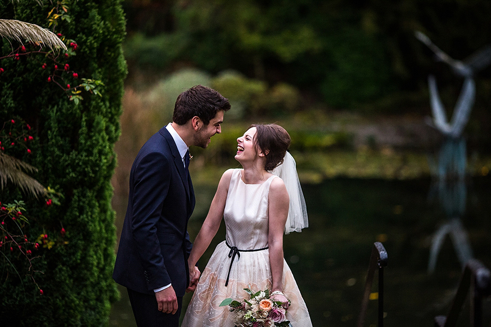 A short 60's inspired REDValentino dress for an Autumn wedding at Le Manoir Aux Quat'Saisons. Photography by Jordanna Marston.