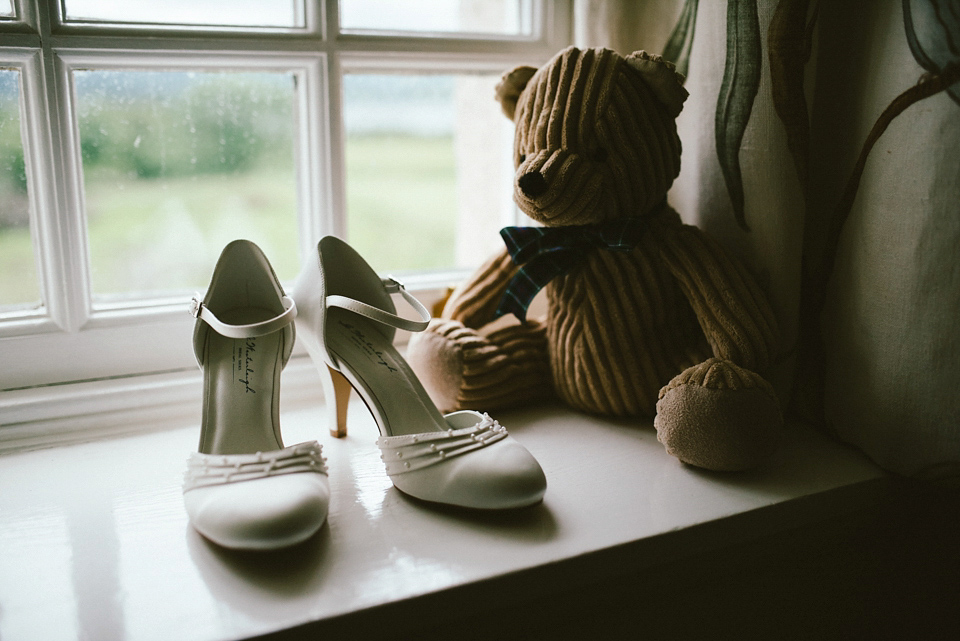 A Raimon Bundo gown for an elegant and intimate castle wedding in Scotland. Photography by Ed Godden.