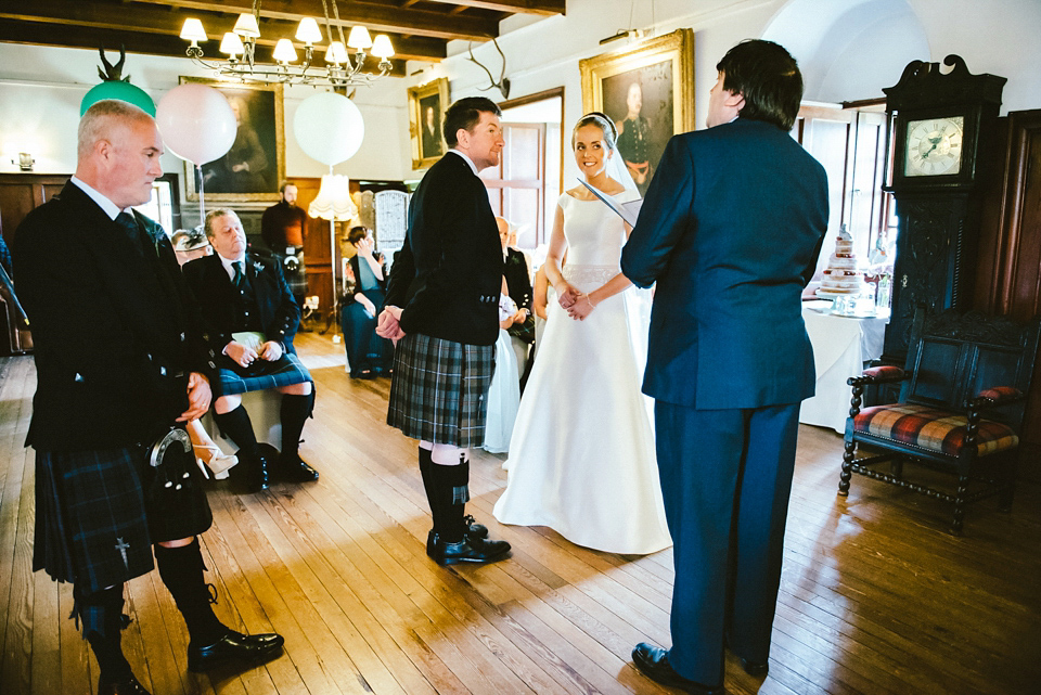 A Raimon Bundo gown for an elegant and intimate castle wedding in Scotland. Photography by Ed Godden.