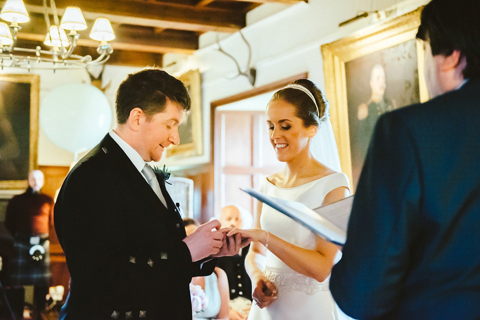 A Raimon Bundo gown for an elegant and intimate castle wedding in Scotland. Photography by Ed Godden.