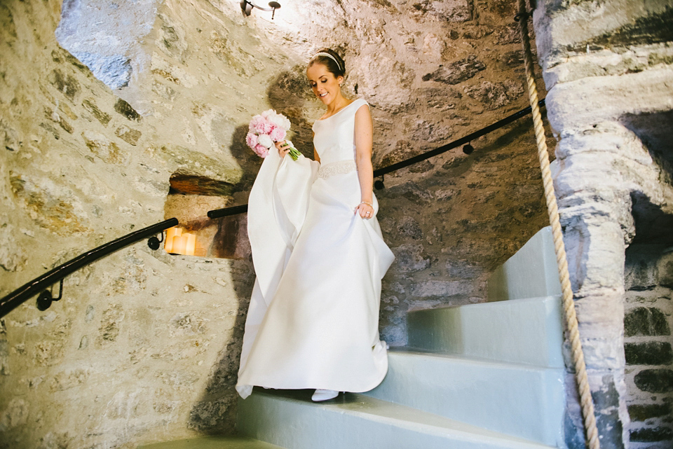 A Raimon Bundo gown for an elegant and intimate castle wedding in Scotland. Photography by Ed Godden.