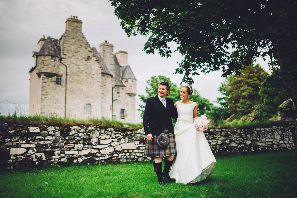 A Raimon Bundo gown for an elegant and intimate castle wedding in Scotland. Photography by Ed Godden.