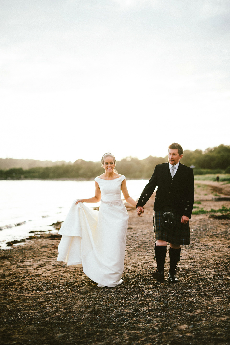 A Raimon Bundo gown for an elegant and intimate castle wedding in Scotland. Photography by Ed Godden.