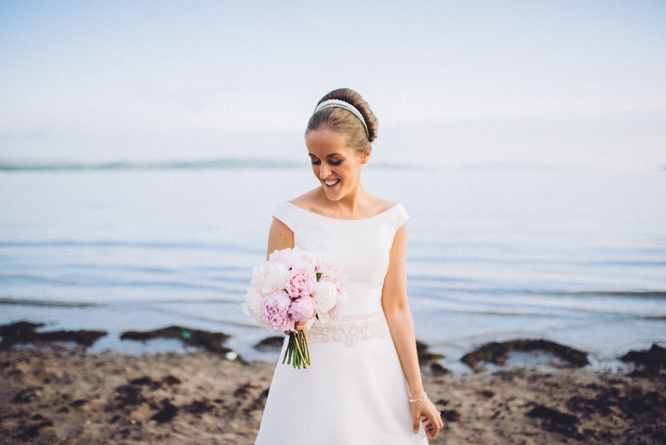 A Raimon Bundo gown for an elegant and intimate castle wedding in Scotland. Photography by Ed Godden.