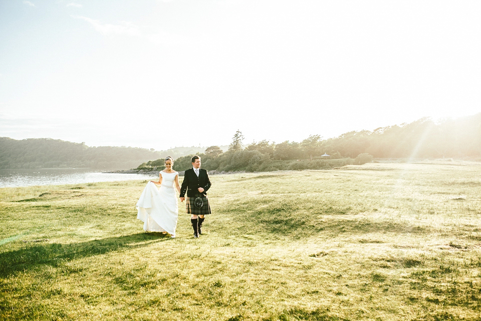 A Raimon Bundo gown for an elegant and intimate castle wedding in Scotland. Photography by Ed Godden.