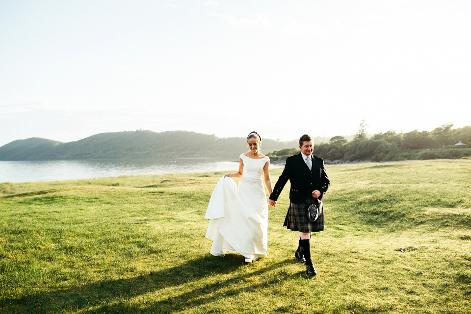 A Raimon Bundo gown for an elegant and intimate castle wedding in Scotland. Photography by Ed Godden.