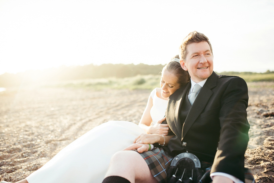 A Raimon Bundo gown for an elegant and intimate castle wedding in Scotland. Photography by Ed Godden.