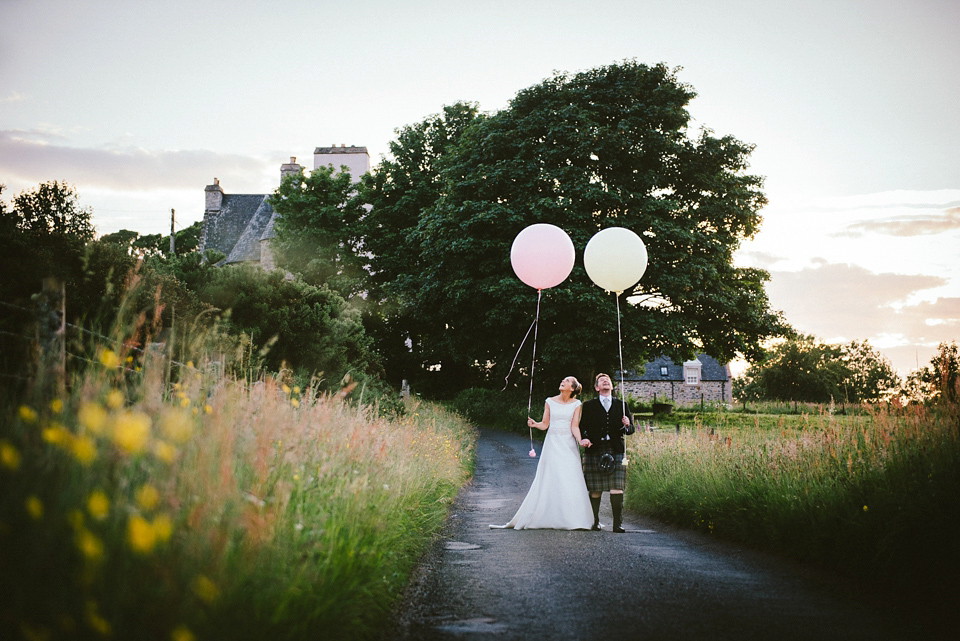 A Raimon Bundo gown for an elegant and intimate castle wedding in Scotland. Photography by Ed Godden.