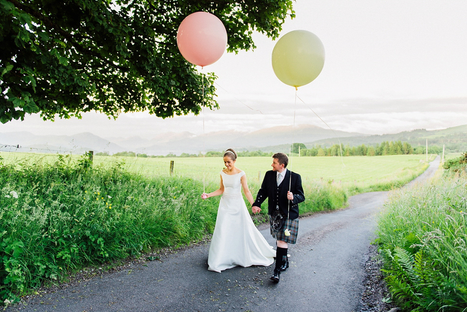 A Raimon Bundo gown for an elegant and intimate castle wedding in Scotland. Photography by Ed Godden.