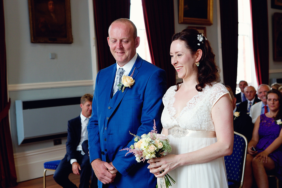 A Claire Pettibone dress for a British and French Summer garden party wedding. Photography by Lydia Stamps.