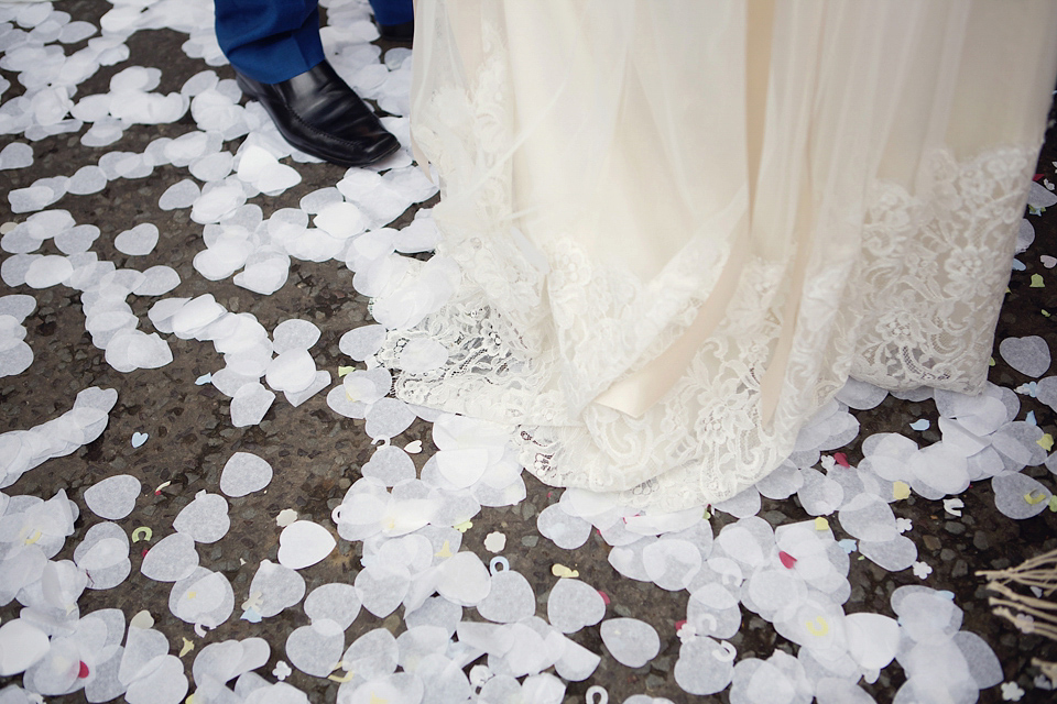 A Claire Pettibone dress for a British and French Summer garden party wedding. Photography by Lydia Stamps.