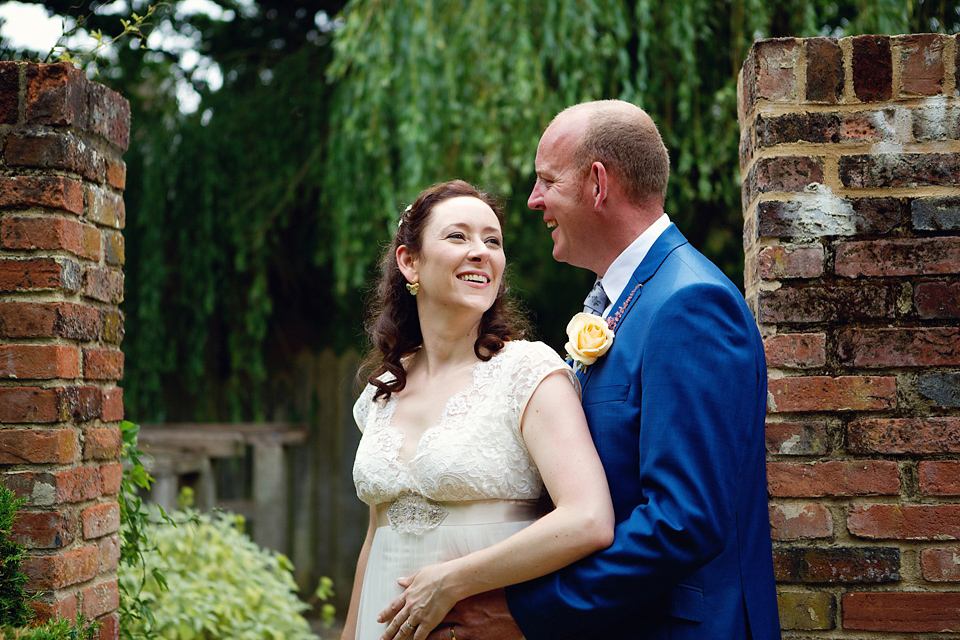 A Claire Pettibone dress for a British and French Summer garden party wedding. Photography by Lydia Stamps.