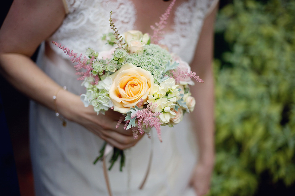 A Claire Pettibone dress for a British and French Summer garden party wedding. Photography by Lydia Stamps.