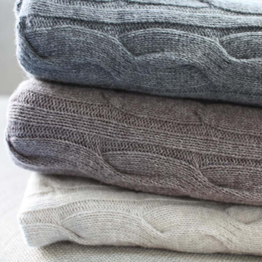 Nkuku Lambswool Throws in Oatmeal from the Prezola wedding gift list service.