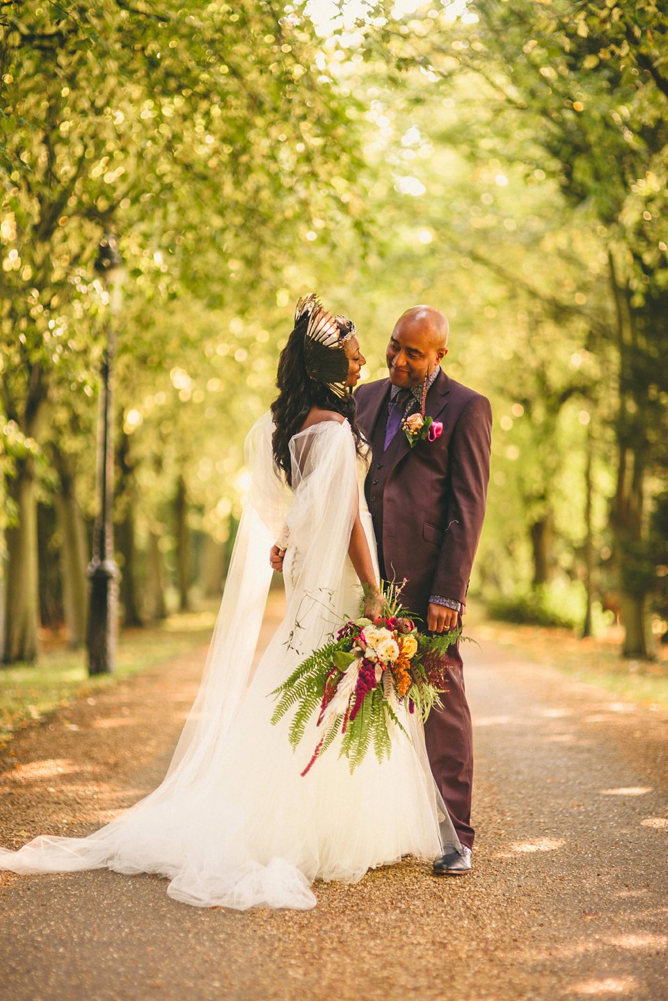 Bold colour and angel wings for a dramatic vintage drama meets whimsical elegance wedding. Images by Miki Photography.