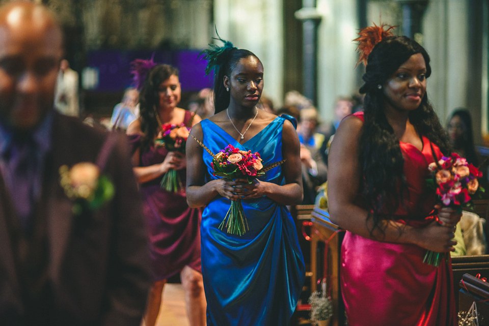 Bold colour and angel wings for a dramatic vintage drama meets whimsical elegance wedding. Images by Miki Photography.