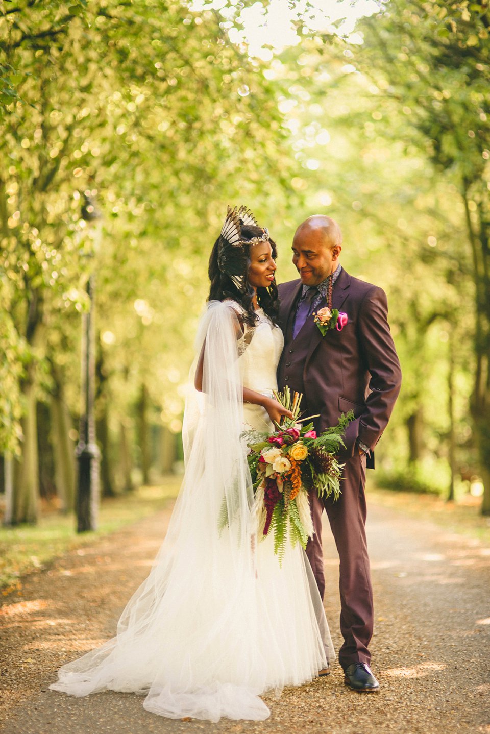 Bold colour and angel wings for a dramatic vintage drama meets whimsical elegance wedding. Images by Miki Photography.