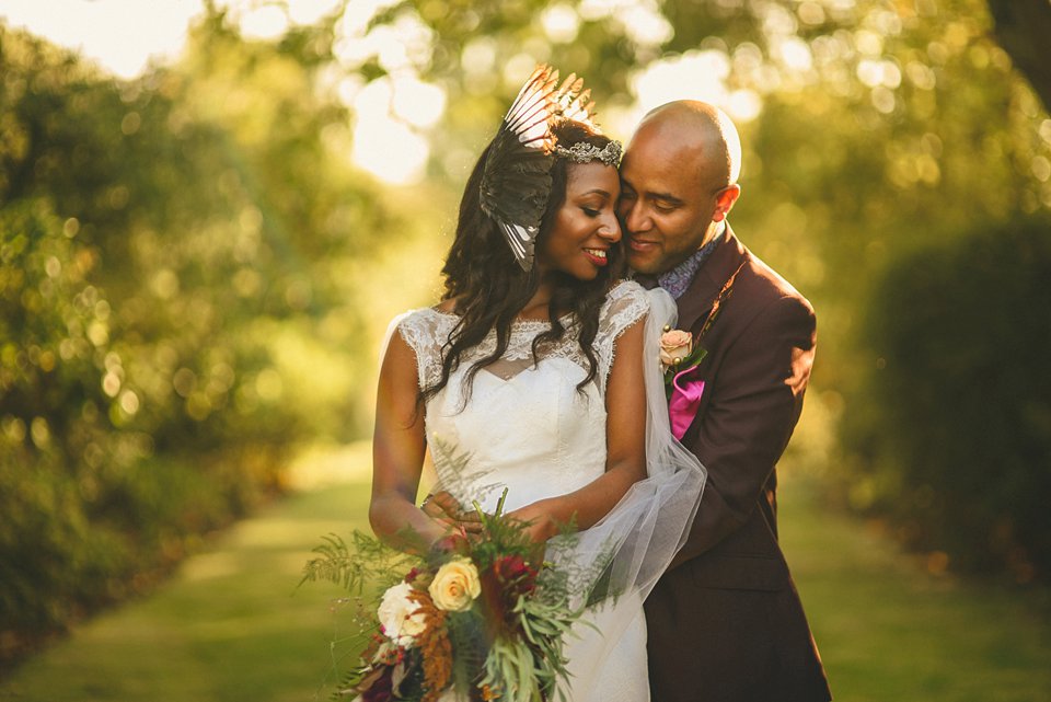 Bold colour and angel wings for a dramatic vintage drama meets whimsical elegance wedding. Images by Miki Photography.