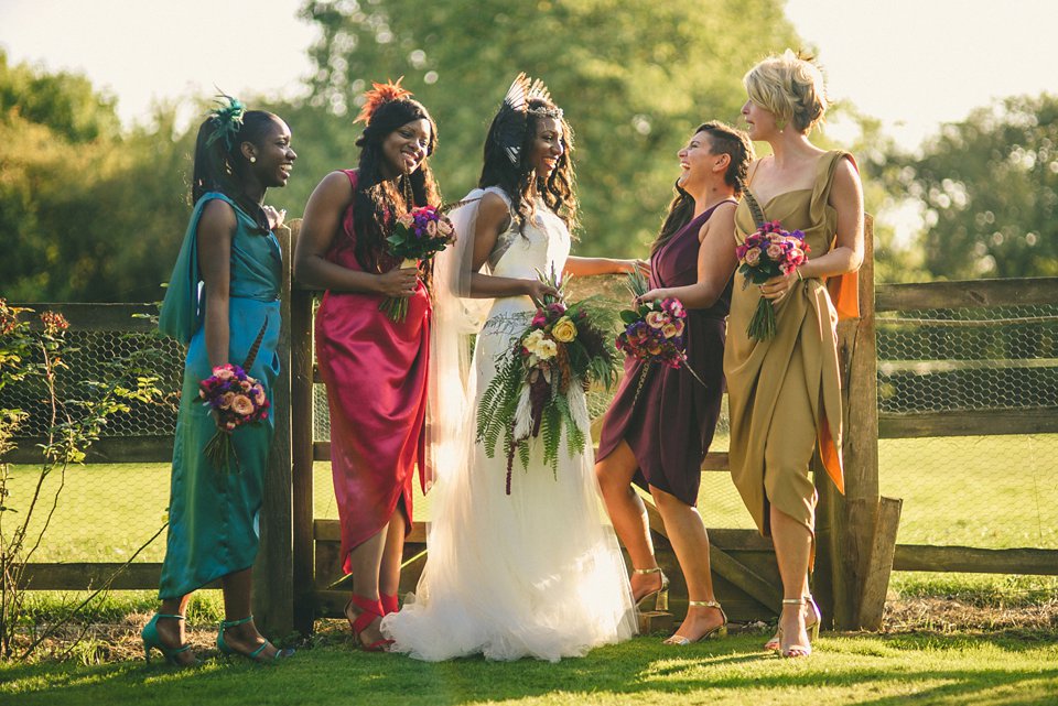 Bold colour and angel wings for a dramatic vintage drama meets whimsical elegance wedding. Images by Miki Photography.