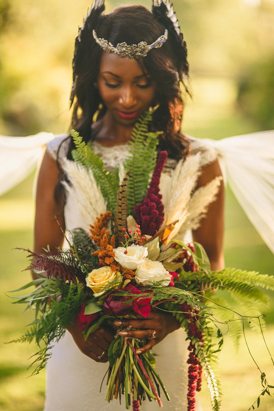 Bold colour and angel wings for a dramatic vintage drama meets whimsical elegance wedding. Images by Miki Photography.