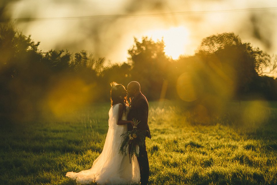 Bold colour and angel wings for a dramatic vintage drama meets whimsical elegance wedding. Images by Miki Photography.