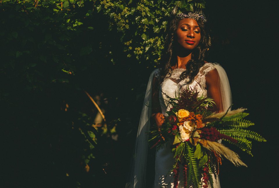 Bold colour and angel wings for a dramatic vintage drama meets whimsical elegance wedding. Images by Miki Photography.