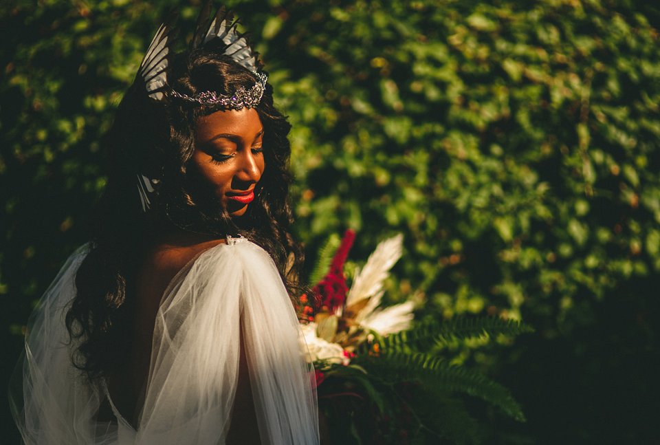 Bold colour and angel wings for a dramatic vintage drama meets whimsical elegance wedding. Images by Miki Photography.