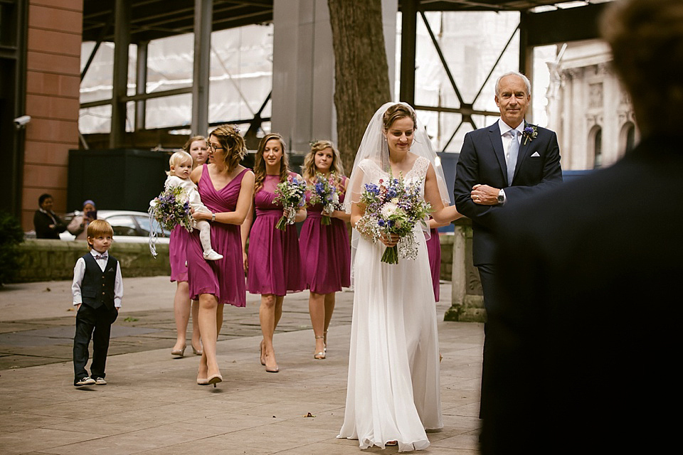 A sweet Dessy bride and her maids in pretty purple for a floral wedding in London. Lily Sawyer Photography.