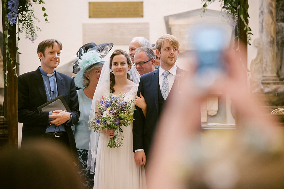 A sweet Dessy bride and her maids in pretty purple for a floral wedding in London. Lily Sawyer Photography.