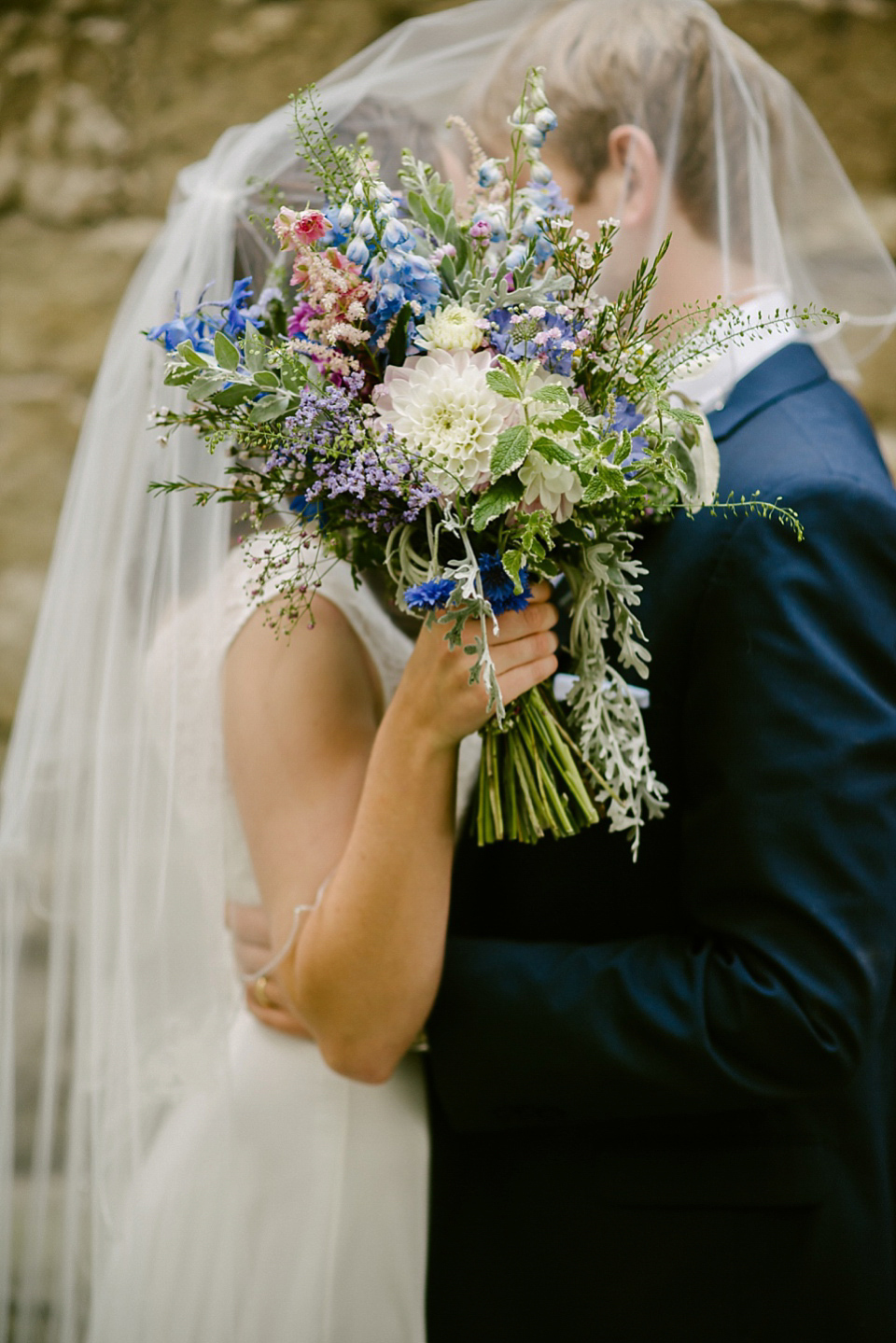 A sweet Dessy bride and her maids in pretty purple for a floral wedding in London. Lily Sawyer Photography.