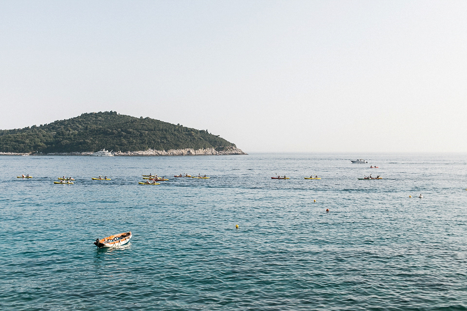 Nataly wore a glamorous Inbal Dror gown for her Midsummer Nights Dream inspired wedding in Croatia. Photography by LIfe Stories Wedding.