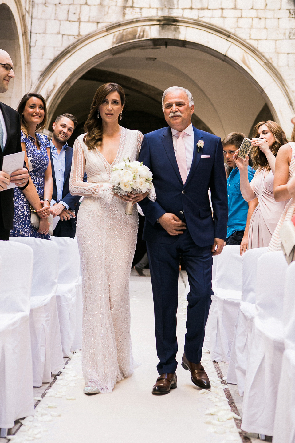 Nataly wore a glamorous Inbal Dror gown for her Midsummer Nights Dream inspired wedding in Croatia. Photography by LIfe Stories Wedding.